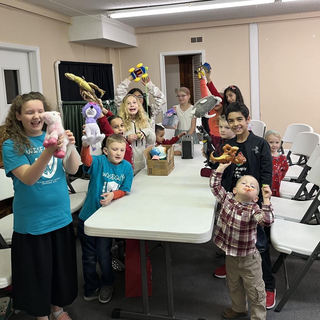 Plains Baptist Church kids program, wiseguys, children's Christmas party with games and white elephant gift exchange